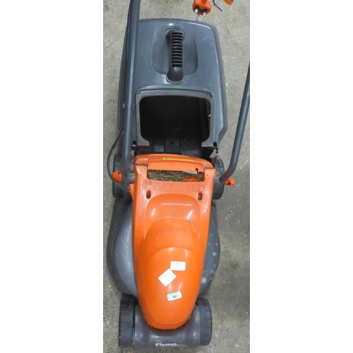 2292 - A Flymo Speedi-Mo lawn mower and a Challenge MHT 5513 240v hedge cutter