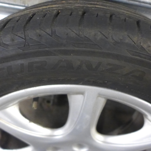 2312 - A set of four Jaguar alloy wheels and tyres size R17