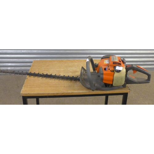 2314 - A Husqvarna 325 HD75 petrol hedge cutter