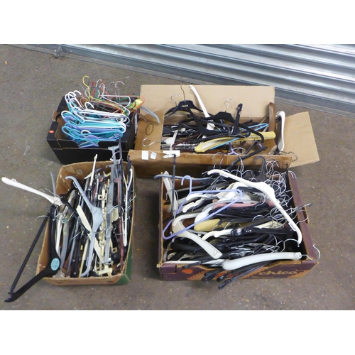 2362 - 4 Boxes of assorted coat hangers