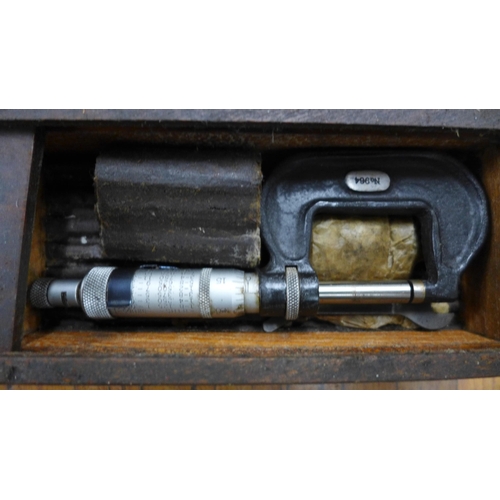 2027 - A box of assorted taps and dies, chain breaking tool kit, a Moore and Wright micrometer, Allen keys,... 