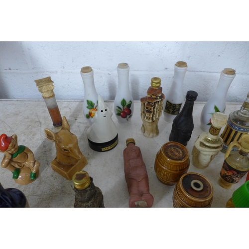 2062 - 46 Novelty miniatures including 12 J M McLech whisky barrels and lanterns, assorted whiskies, other ... 