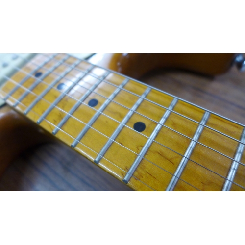 2072 - A Stagg Logie oak and mother of pearl effect 6-string electric guitar