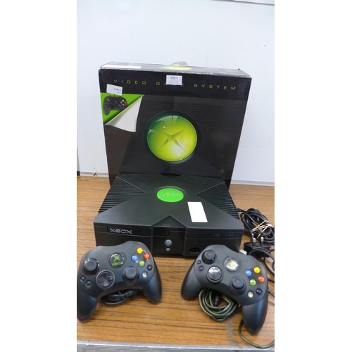 2087 - An Original Xbox games console with two original wired Xbox controller pads, power cable, A/V cables... 