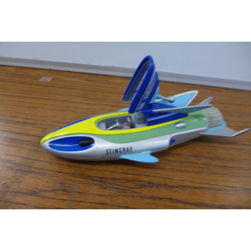 2099 - A selection of plastic Thunderbird models including Thunderbird 2, Thunderbird 4, The Mole, Firefly ... 