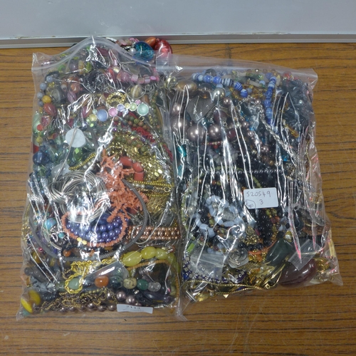 2113 - Two bags of costume jewellery