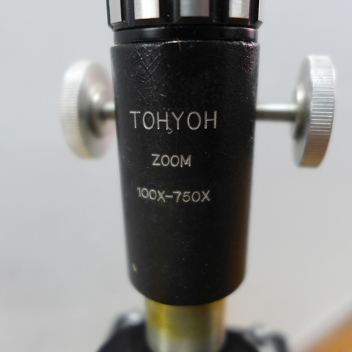 2115 - A Tohyoh zoom 100x-750x microscope