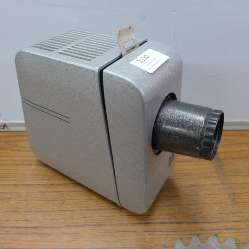 2120 - A Meyer Optik Görlitz Diaplan projector, six escape route signs, a 30m BMI tape measure, a Power Cra... 