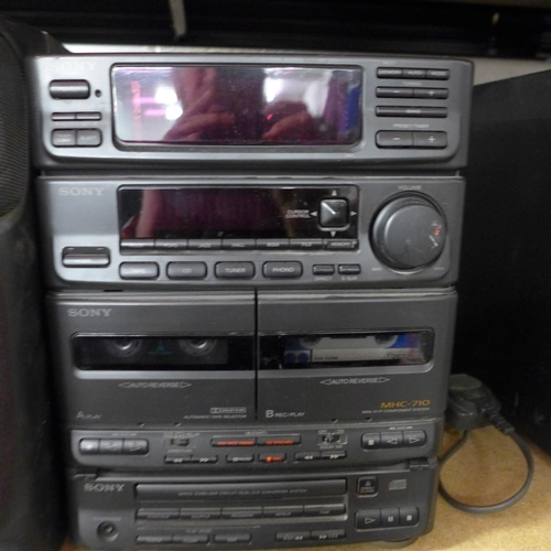 2155 - An Aiwa CD-N430K compact disc stereo system, a Sony MHC-710 mini hi-fi component system, a Datavideo... 