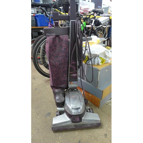 2174 - A Kirby Performance Micron Magic vacuum cleaner with 4 boxes of attachments and spare bags