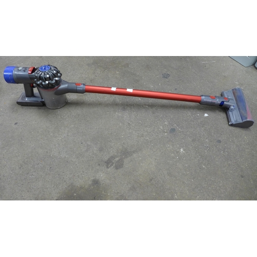 2215 - A Dyson V8 vacuum cleaner with motorised hard floor brush- no charger - W