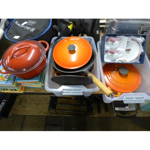 2385 - A collection of steel pans and cookware including Le Creuset and a Mackintosh porcelain tea cup set