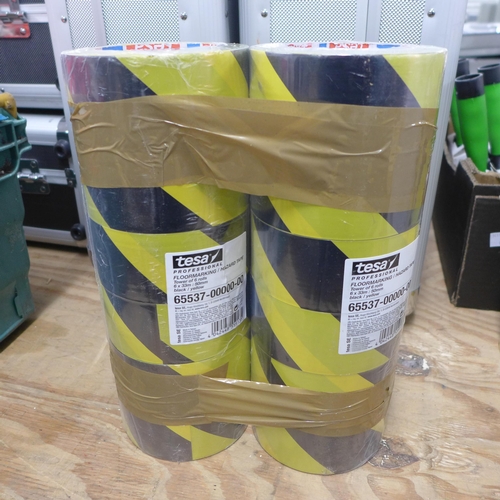 2414 - A pack of 12 rolls of yellow and black hazard tape