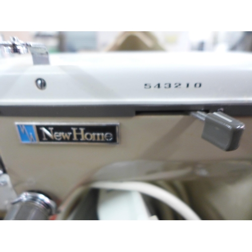 2433 - A New Home sewing machine (543210)