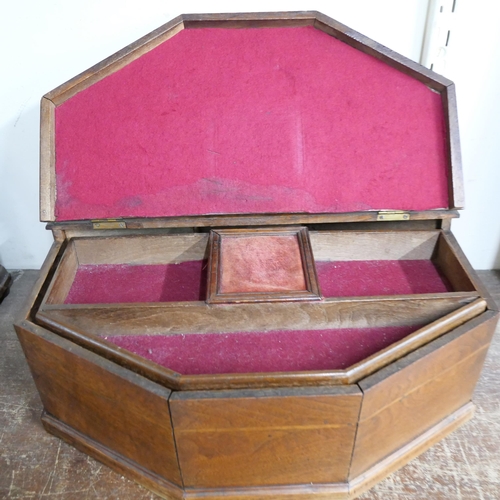 294 - An early 20th Century octagonal walnut jewellery box