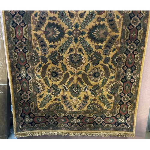 1459A - An ivory ground full pile Cashmere rug with floral medallion design, 170 x 120cm