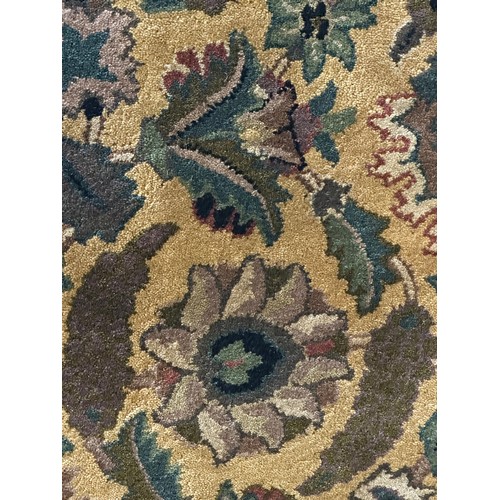 1459A - An ivory ground full pile Cashmere rug with floral medallion design, 170 x 120cm