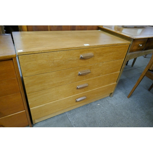 57 - A teak chest of drawers