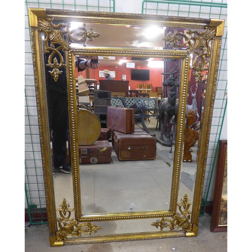 302 - A large French style gilt framed mirror