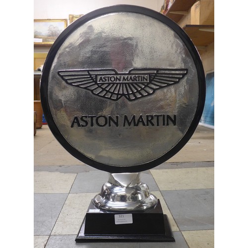 321 - An Aston Martin motoring desk emblem