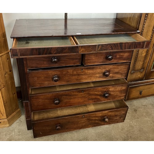 94 - A George III inlaid mahogany chest of drawers