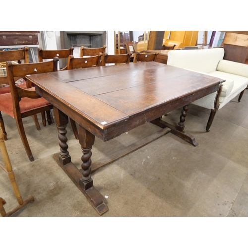 598 - An early 20th Century oak barleytwist metamorphic refectory table/settee