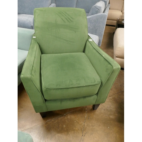 1304 - A green velvet accent chair