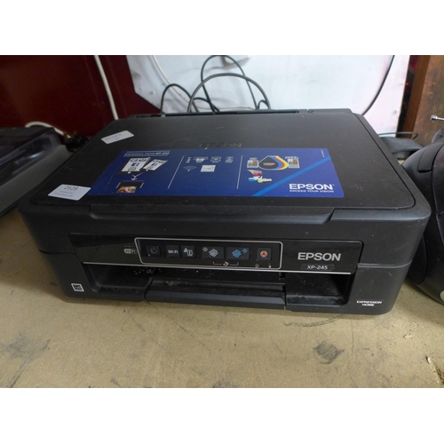 2136 - A compact disc player/radio and an Epson Expression Home XP-245 printer and scanner