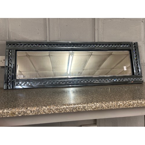 1470 - A smoked glass hall mirror with bevelled edge glass and border filled glass crystals, 120 x 40cms (G... 
