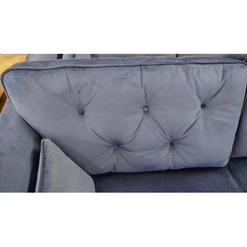 1546 - A Hoxton blue velvet three seater sofa - slight damage