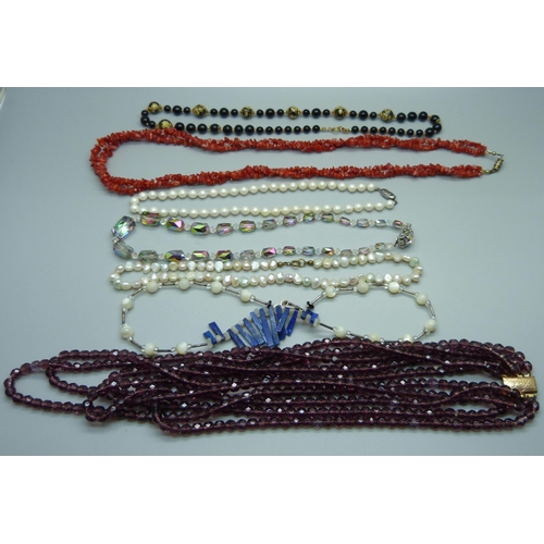 1050 - Seven vintage necklaces including coral and lapis lazuli