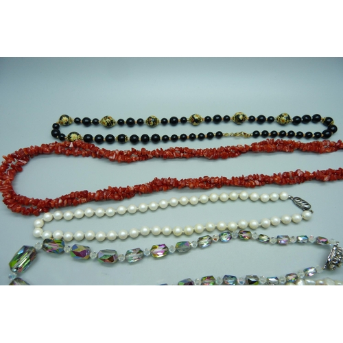 1050 - Seven vintage necklaces including coral and lapis lazuli