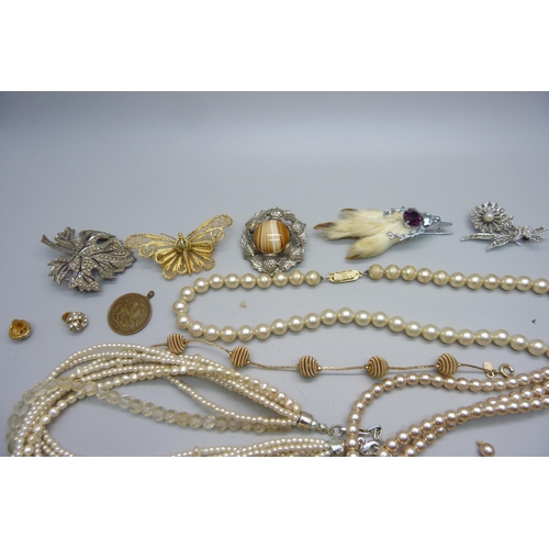 1056 - Costume jewellery, brooches, faux pearls, etc.