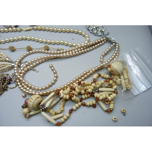 1056 - Costume jewellery, brooches, faux pearls, etc.