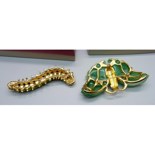 1062 - A Kenneth Jay Lane (KLJ) simulated jade butterfly brooch and a blue stone caterpillar brooch lacking... 