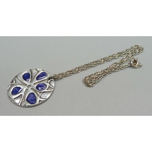 1063 - A 925 silver chain with a 999 silver pendant, maker MLW