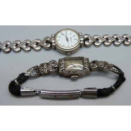 1068 - A lady's marcasite set wristwatch and a lady's silver wristwatch