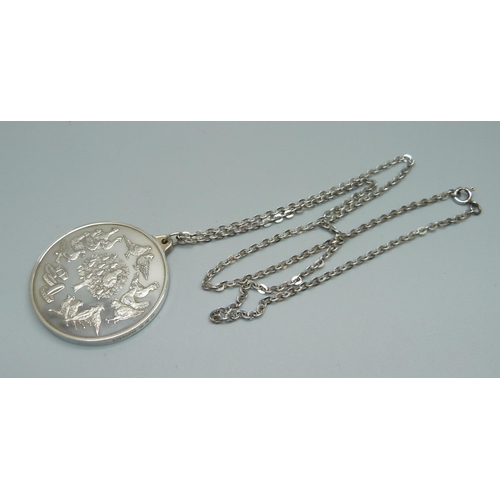 1089 - A Twelve Days of Christmas silver medallion on chain, boxed, 60g