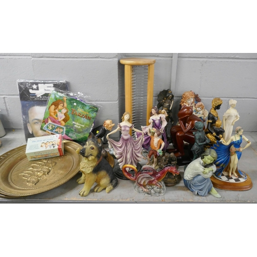 1094 - A collection of figures including Lladro seated ballerina, oriental figure, CD rack, Disney windshie... 