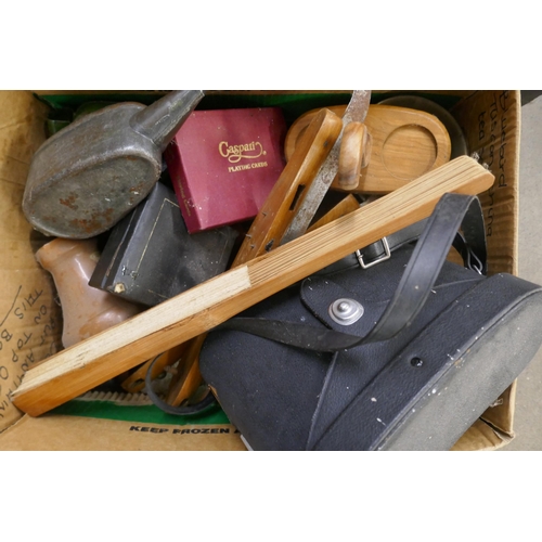 1104 - Two boxes of assorted items, including treen, candlesticks, binoculars, oil cans, etc. **PLEASE NOTE... 