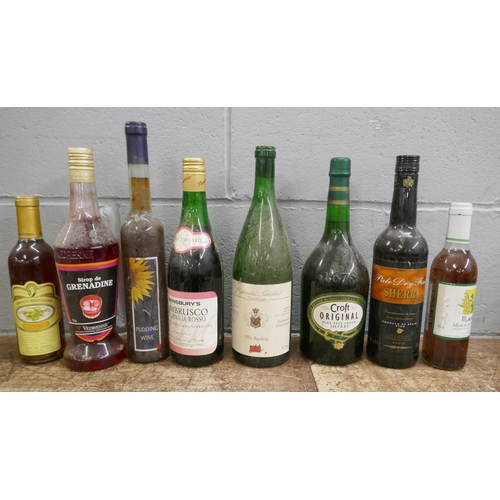 1130 - Eight bottles of assorted wine, Grenadine, Brown Brothers, Harveys, etc. **PLEASE NOTE THIS LOT IS N... 