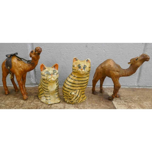 1133 - Two leather model camels and a pair of hand painted papier mache cats **PLEASE NOTE THIS LOT IS NOT ... 