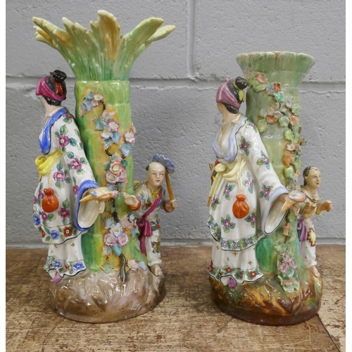 1134 - Two figural candle holders