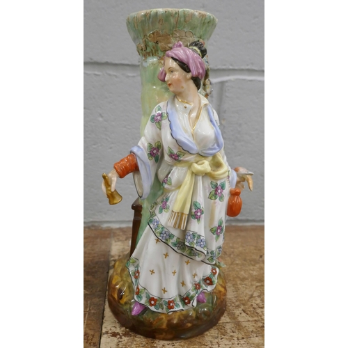 1134 - Two figural candle holders