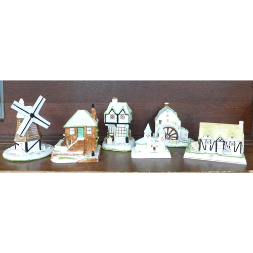 614 - A collection of Coalport cottages