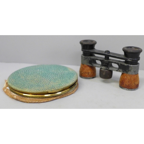 616 - A pair of opera glasses and a shagreen covered compact