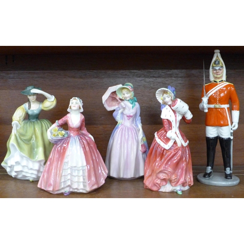 619 - Five Royal Doulton figures; Christmas Morn, The Lifeguard, Miss Demure, Buttercup and Janet