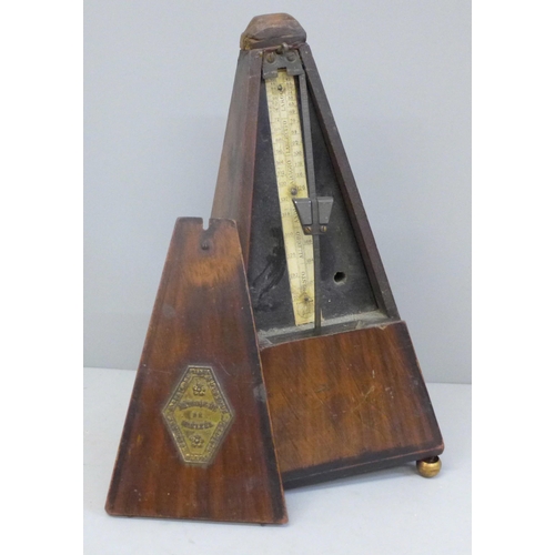628 - A Maelzel metronome, lacking catch and base a/f