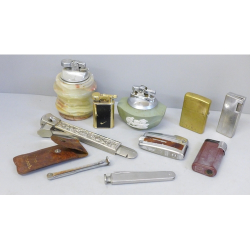 640 - A Wedgwood Jasperware table lighter, other lighters, cigar cutters, etc.