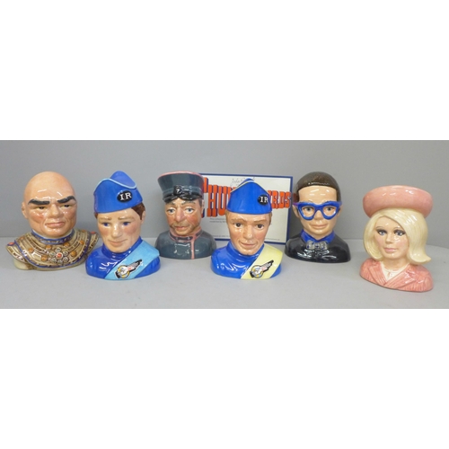 645 - Six Beswick Thunderbirds ceramic busts; Lady Penelope, Parker, Brains, Scott and Virgil Tracy and Th... 